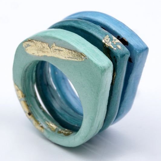 anillo de papel rainbow azul infinito y piedras semipreciosas. marca papyrus world. #anillodepapel #anilloshechosconpapel #anilloselaboradosconpapel #anillosdepapel #anillodepapelreciclado #madridsecreto